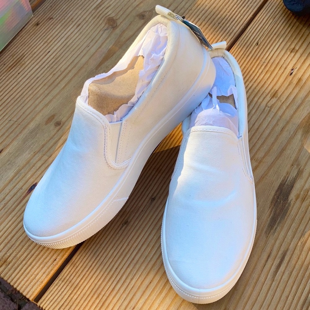 Skecher street white slip on sneakers. Size W10